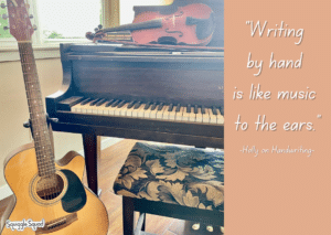 A guitar, violin, and piano are arranged together near a patterned bench. A quote on the right reads, "Writing by hand is like music to the ears. -Holly on Handwriting-.